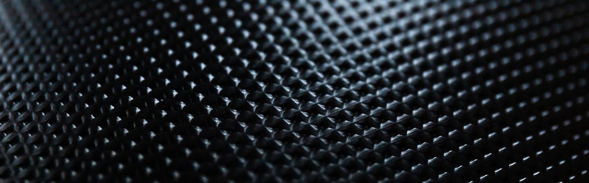 Close-up of a dark textured surface