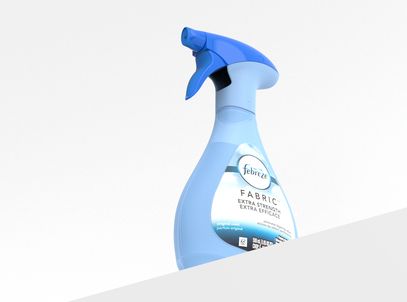 Febreze Fabric spray bottle on a light gray background