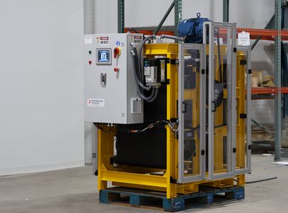 TREW automated material handling machine standing in a warehouse